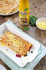 Pannenkoekrolletjes met spinazie, salami en kaas